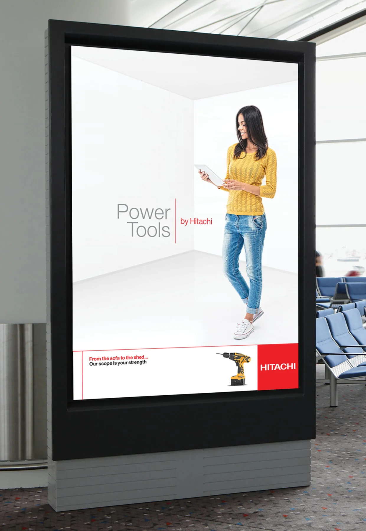 ‘Power Tools by Hitachi’ billboard featuring a woman with a drill