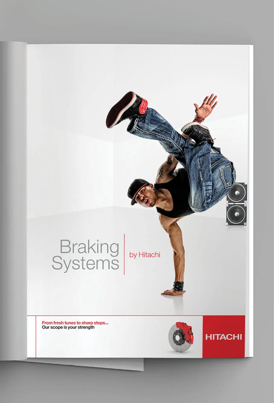 ‘Braking Systems by Hitachi’ advert featuring a breakdancer