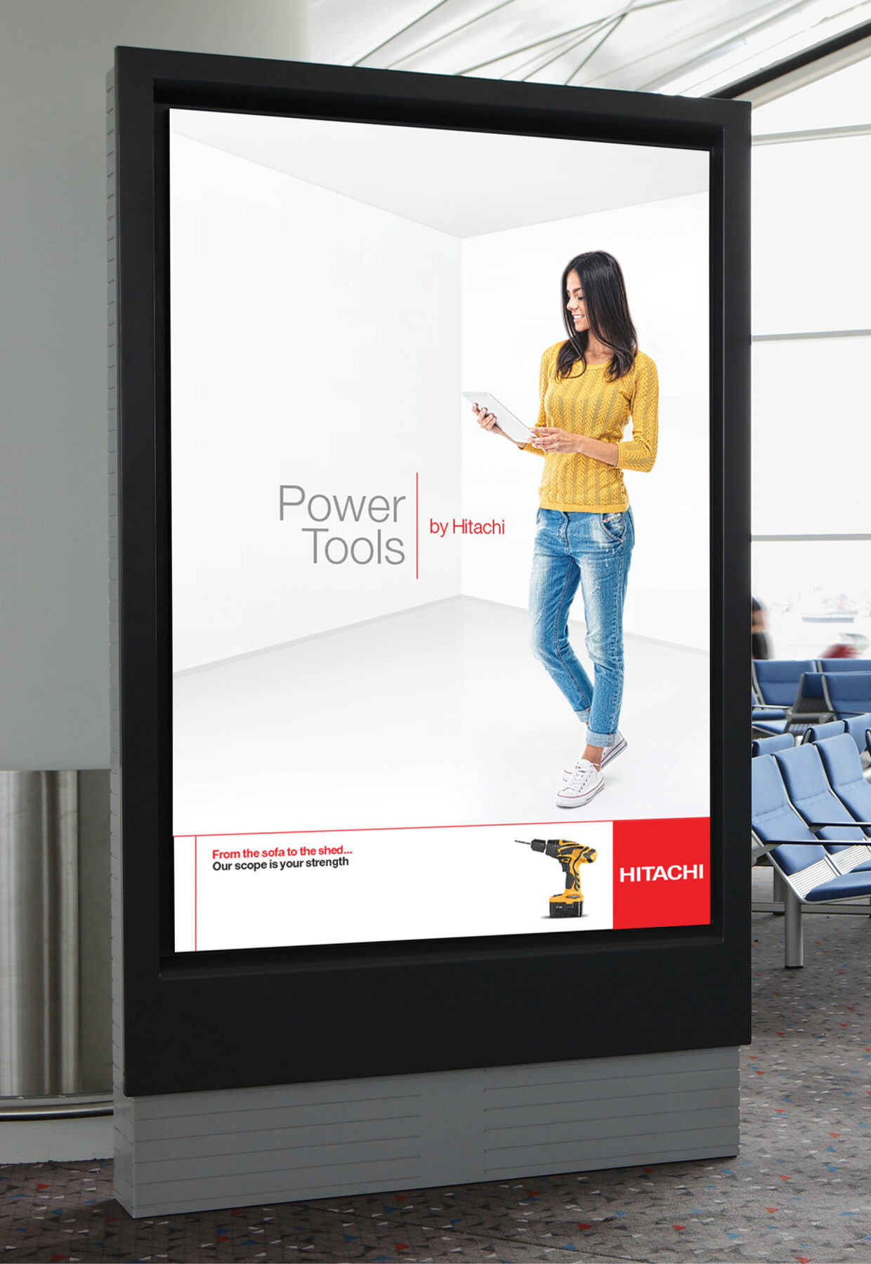 ‘Power Tools by Hitachi’ billboard featuring a woman with a drill