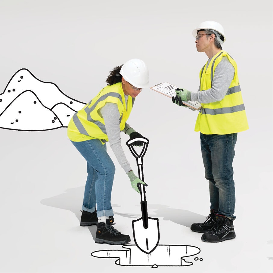 An illustration of two workers at a ground-breaking